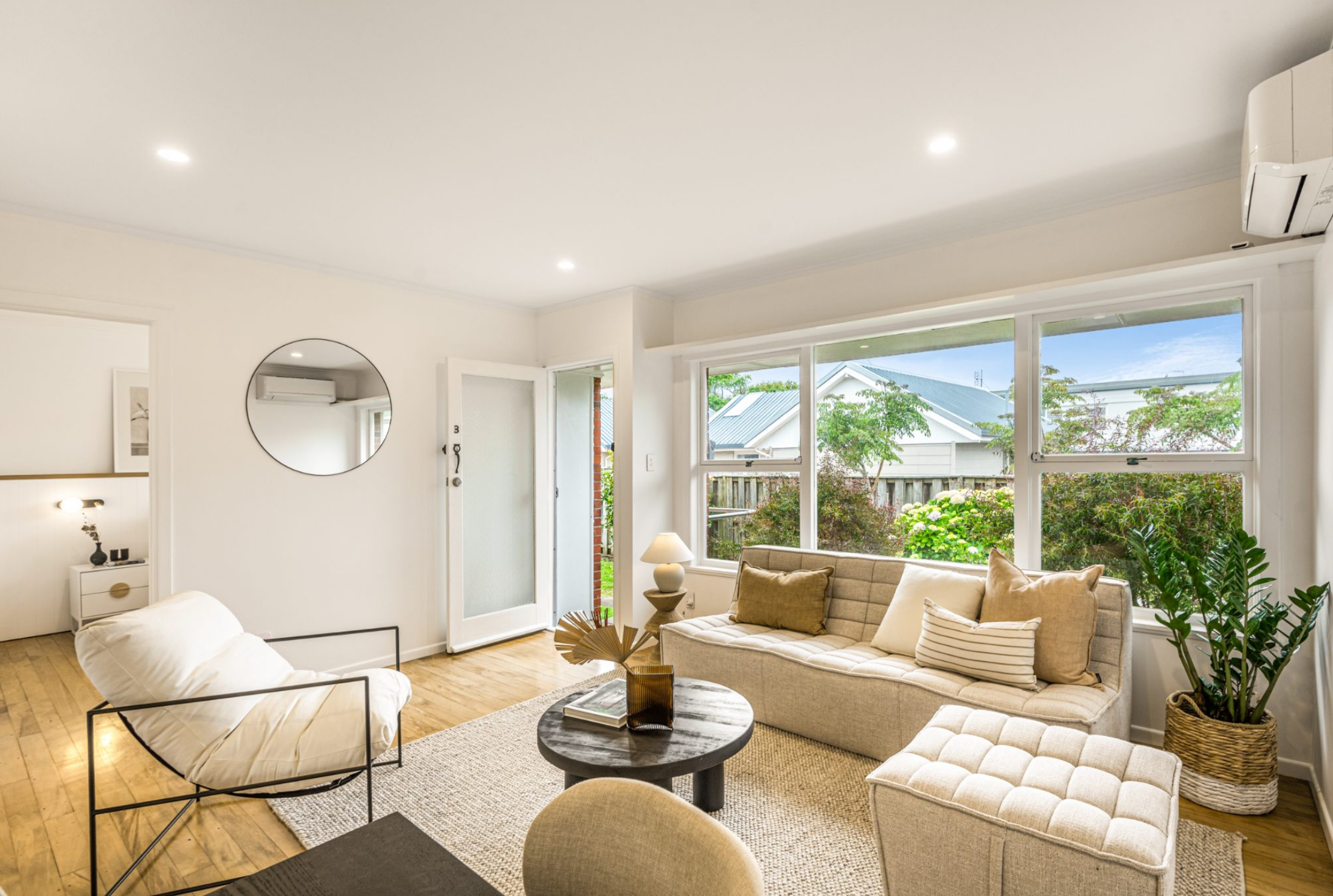 A bright, welcoming lounge in a beautifully presented New Zealand rental home