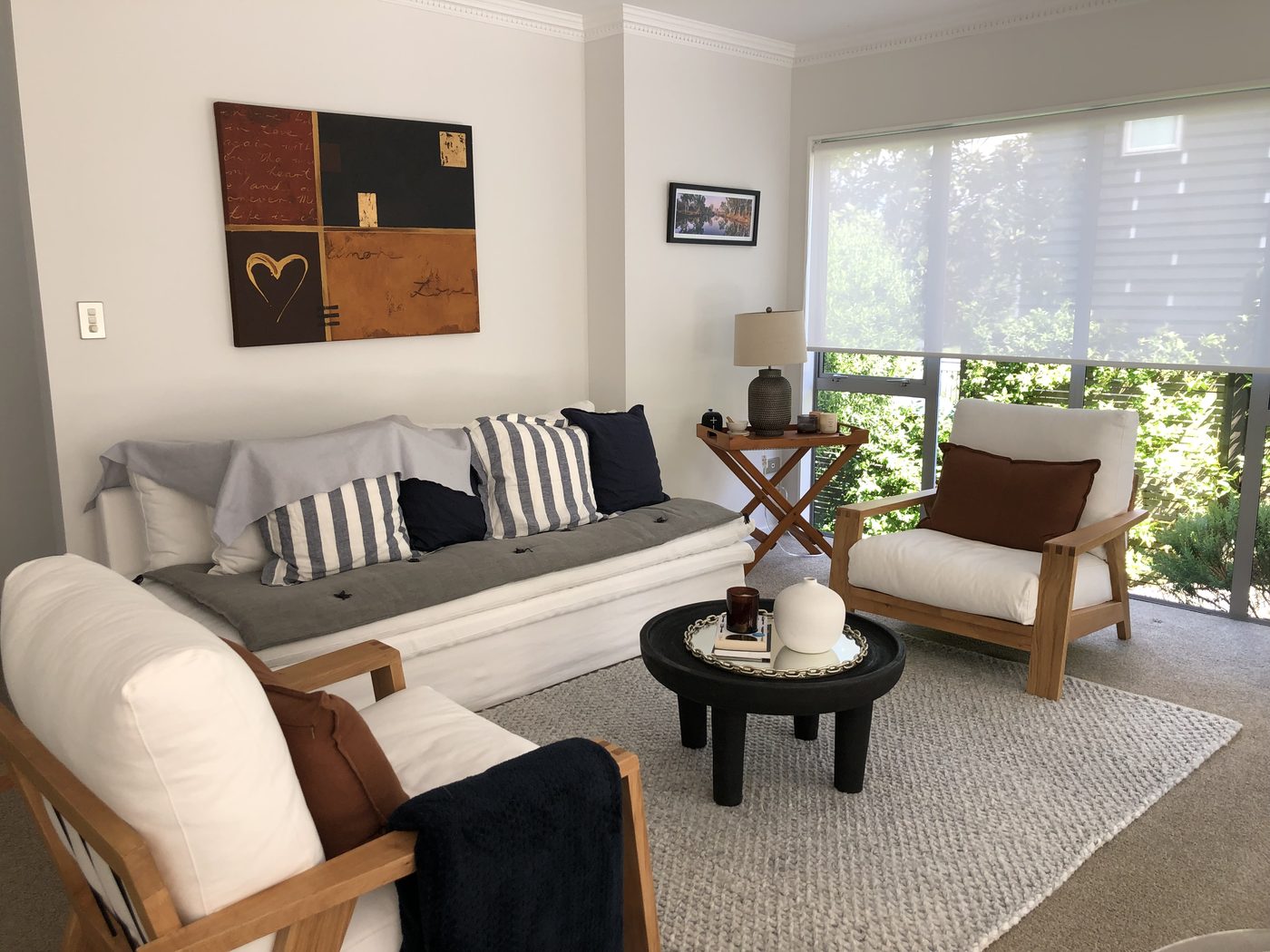 A warm, sunlit lounge in a beautifully presented New Zealand rental home
